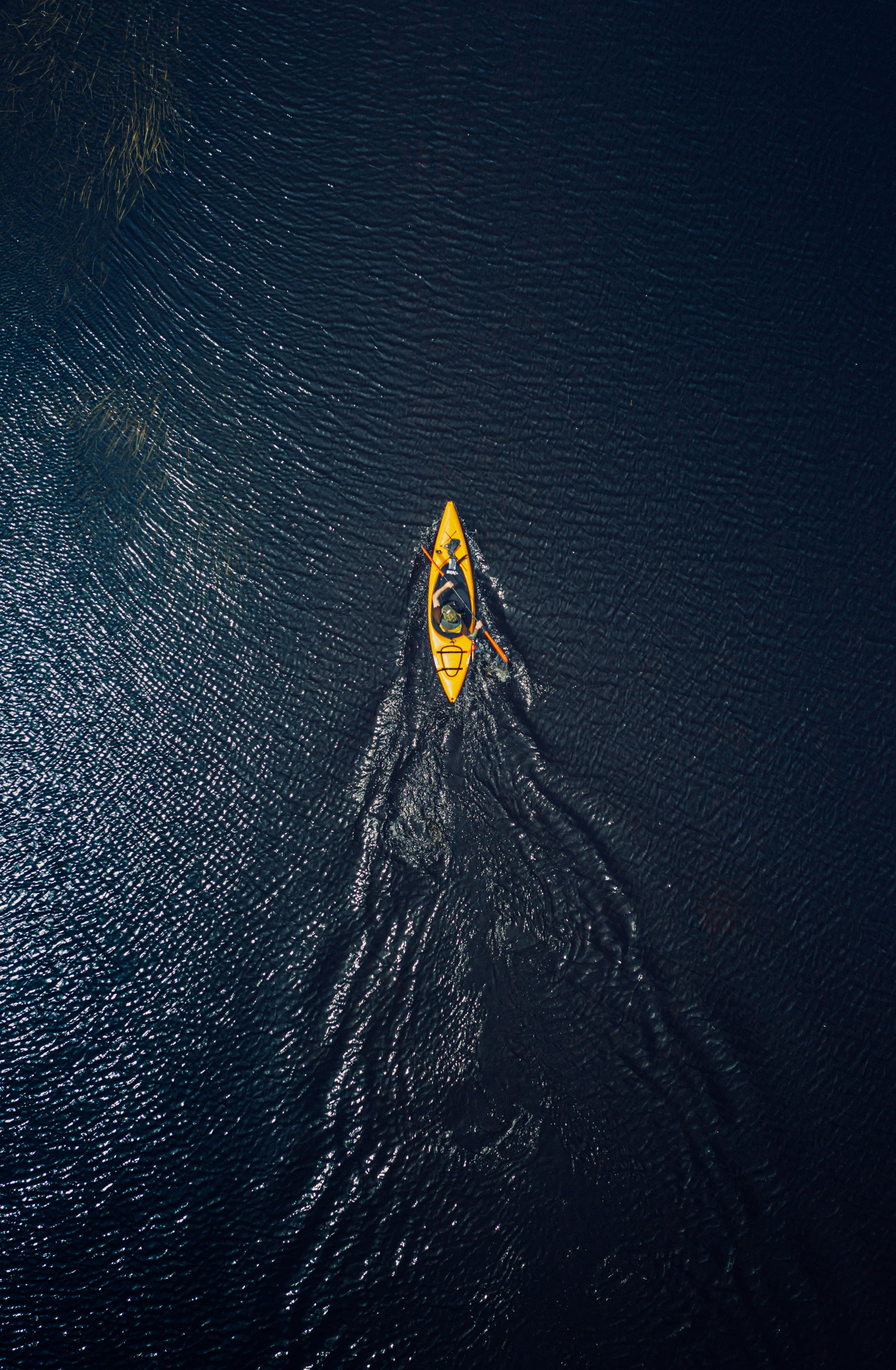 A single kayaker paddling in the Stockholm Archipelago